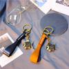 Handmade Retro Kitten Pendant Keychain with Top Grain Cowhide and Alloy Horseshoe Buckle