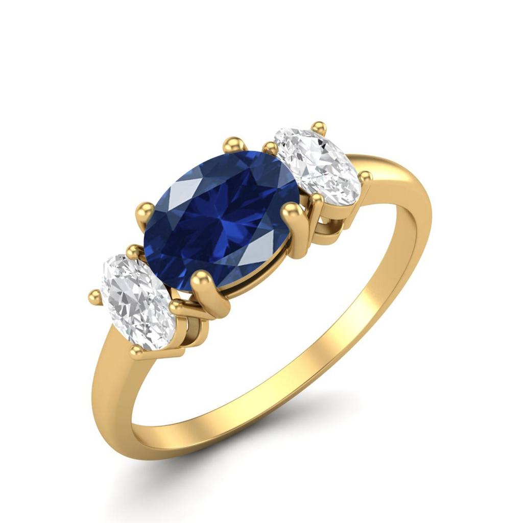 925 Sterling Silver Blue Cz Three Stone Yellow Gold Plated Ring