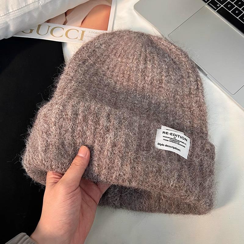 The New Woolen Hat Shows Off Your Face. It's A Trendy Knitted Hat with A Fabric Patch for Warmth Ear Protectors and Headscarves