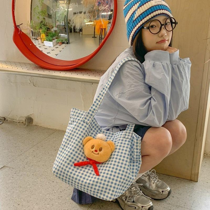 Cute bear backpack, new blue plaid shoulder tote bag, large-capacity casual commuter canvas backpack.