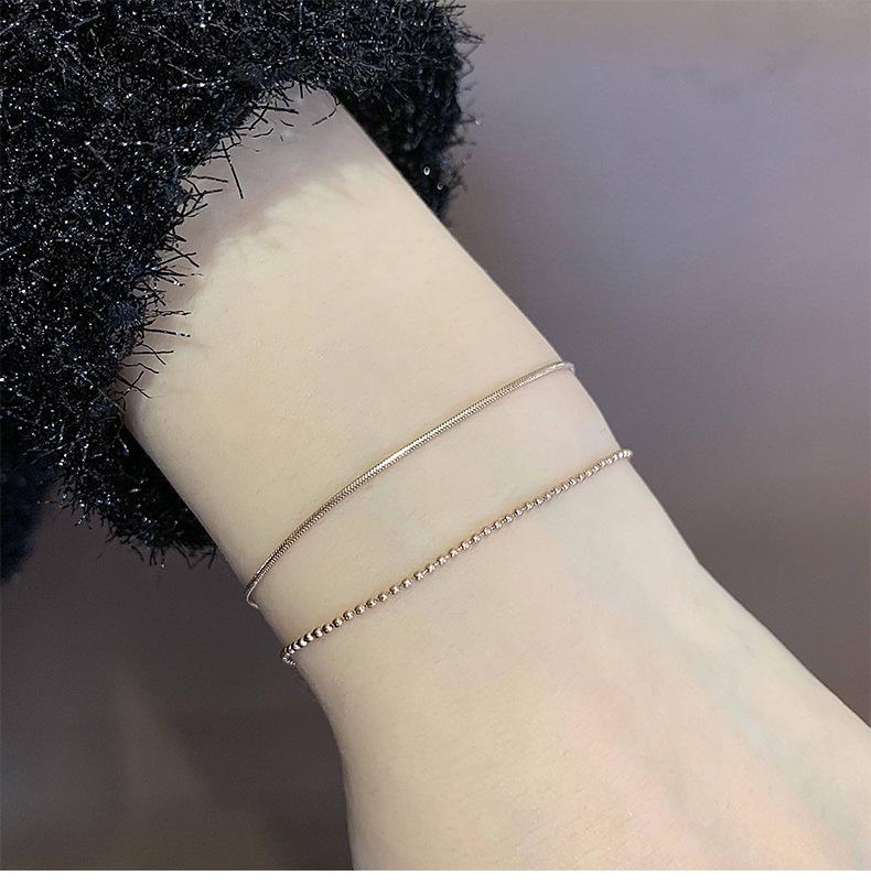 Zweireihiges Titanstahl Goldbeschichtet Perlenarmband
