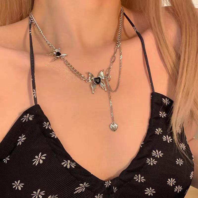 

Liquid butterfly fringed necklace, new high-end design, light luxury niche sweater chain, women s spring and summer