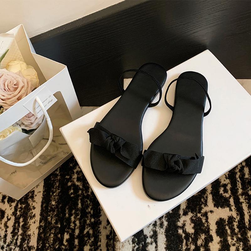 Fashion famous fabric bowtie flat sandals women black ankle strap gladiator sandalias mujer elastic band sandalias de mujer verano 2025