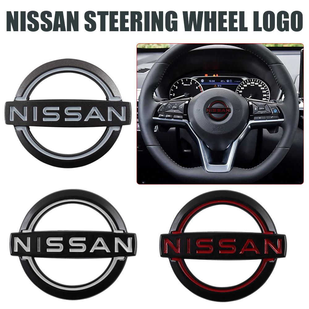 AOK3 1 Pezzo ABS Adesivi Emblema Logo Centrale Volante Auto Per Nissan Nismo Xtrail Sentra Qashqai Note Leaf Juke Rogue Almera Sylphy