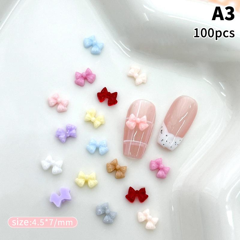 100Pcs 3D Mini Bow Resin Nail Art Decoration Bowknot Ornament Nail Charm Jewelry Design Kawaii Gem