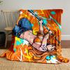 Dynamic figure with vibrant orange and blue splashes and lightning bolts. for all seasons blanket lunch break throw gift