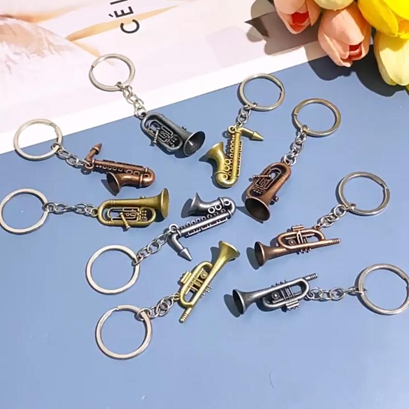 Winziger Saxophon-förmiger Schlüsselanhänger Hochwertige Metallkonstruktion Tolles Geschenk für einen Freund Saxophon-Schlüsselanhänger Taschenanhänger