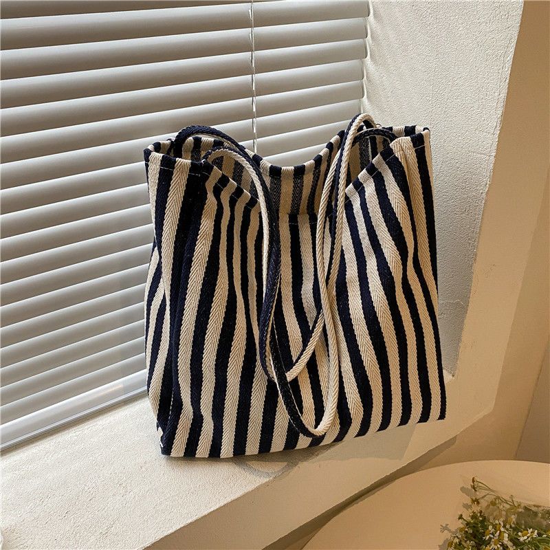 Textured large-capacity simple striped canvas bag women's 2025 new trendy fashion literature and art student class handbag
