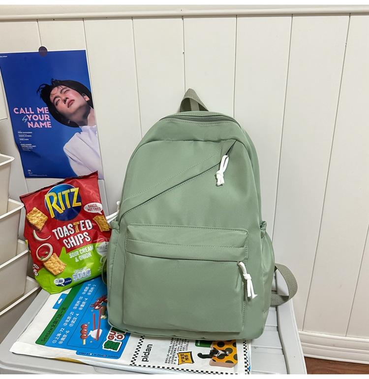 Schoolbag Classic Junior high school schoolbag for women, niche design sense, student backpack for girls, simple casual backpack for men
