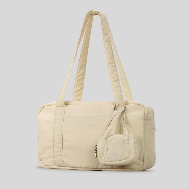 

Повседневная глянцевая цилиндрическая сумка женская нишевая легкая спортивная нейлоновая сумка через плечо бежевый