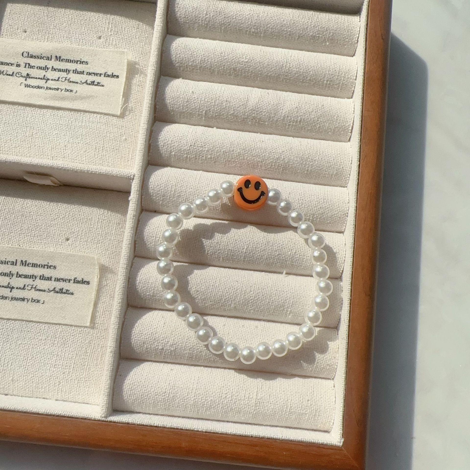 

Korean-Style Acrylic Smile Face Pearl Bracelet for Women - Creative Handmade Elastic Beaded Jewelry оранжевый