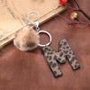 Western Cowboy Leopard Print Leather Keychain with Acrylic Letter and Plush Ball Accessories