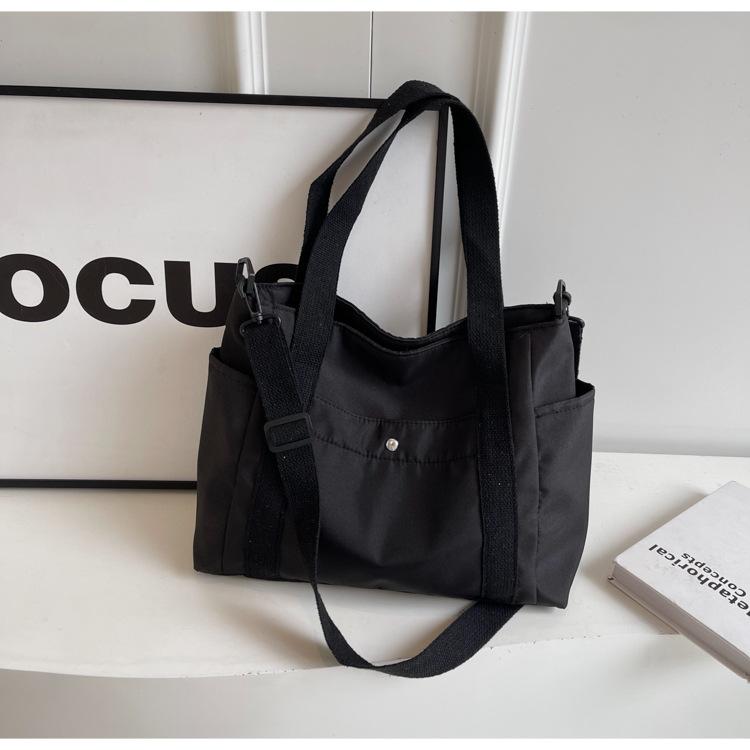 

Canvas bag women s new fashionable versatile shoulder bag to work commuter bag Korean version oblique span bag large-capacity tote bag