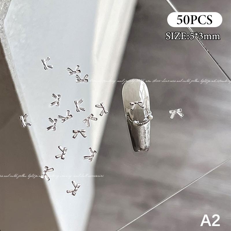 

50 шт. Сплав Бант Бабочка Сделай сам Золото Серебро Украшения для ногтей Аксессуары для ногтей Шарм для ногтей Дизайн ногтей Маникюрные принадлежности A2