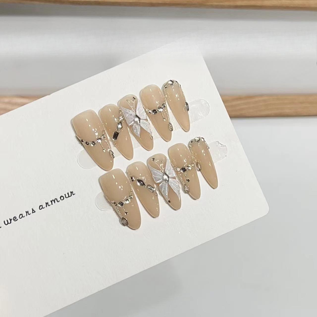 

Плетеная вручную броня Продвинутая атмосфера Телесный цвет Флэш-бриллиант Расписанный вручную патч для ногтей с бабочкой Съемные накладные ногти large L