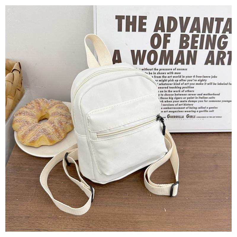 Mini Women's Backpack Trends: Nyl Women's Bags, Small Schoolbags, and White Canvas Backpacks Are Fashiable and Casual Pick