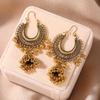 European and American vintage tassel hanging moon bell earrings, fashionable design with an exotic ethnic style and exaggerated earrings for women