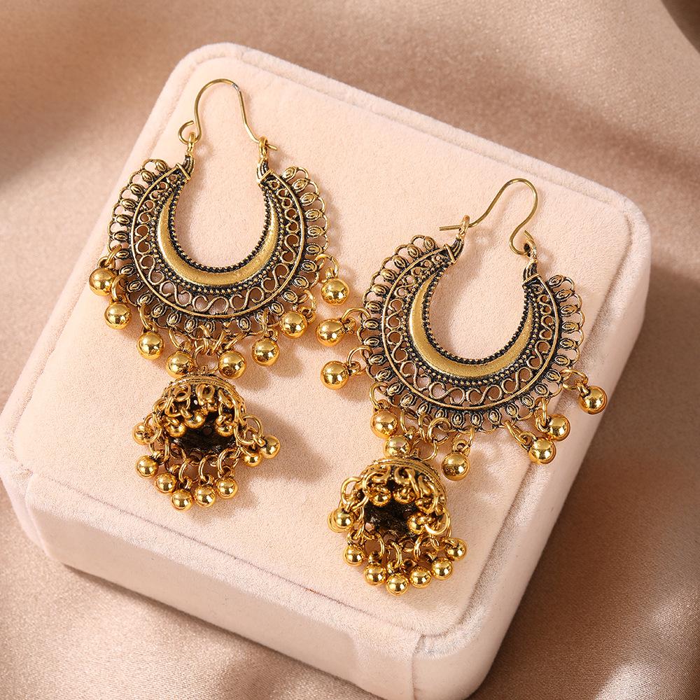 European and American vintage tassel hanging moon bell earrings, fashionable design with an exotic ethnic style and exaggerated earrings for women