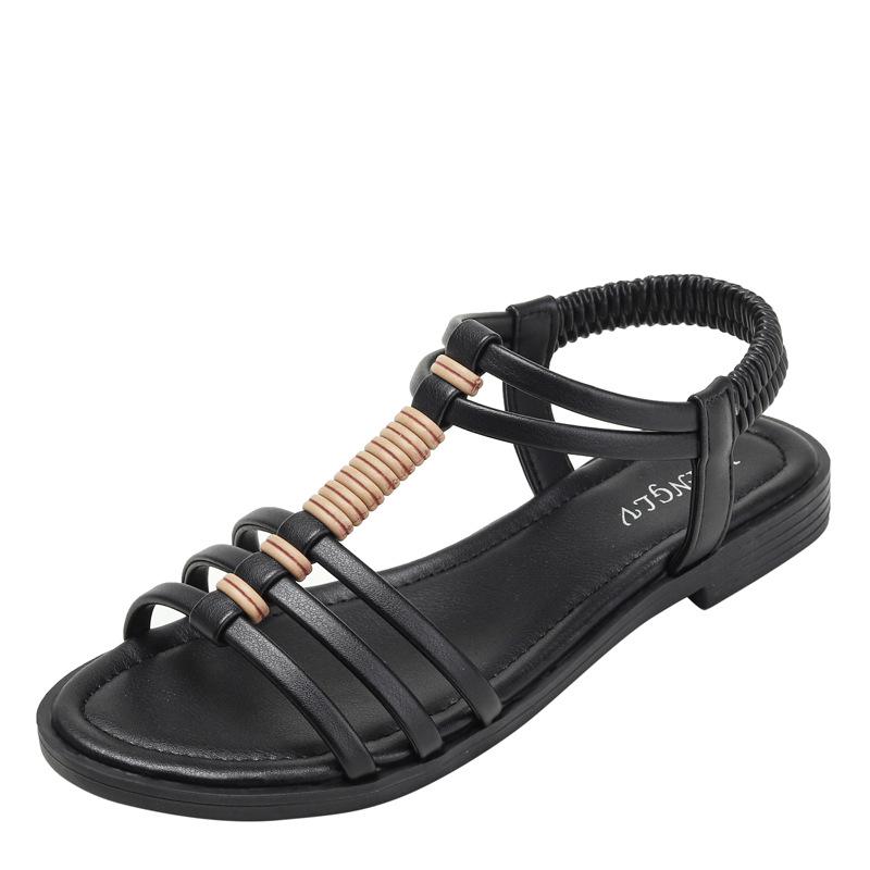 2025 Summer Bohemian Retro Flat Roman Sandals: Comfortable Hollow Design for Travel and Beach