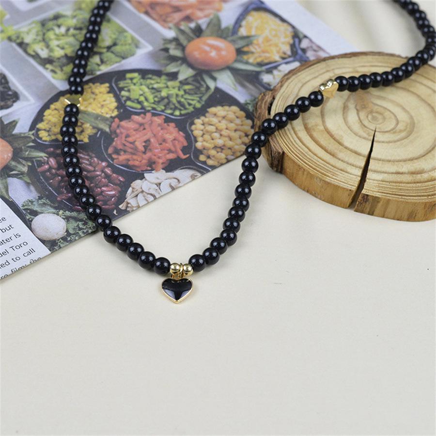 Elegant Black Pearl Necklace with Heart Pendant - Fashionable Clavicle Chain for Women
