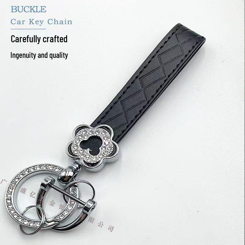Elegant Rhinestone French Keychain Pendant - Stylish Ins Style Goddess Bag Ornament Hollow Plum Blossom чёрный