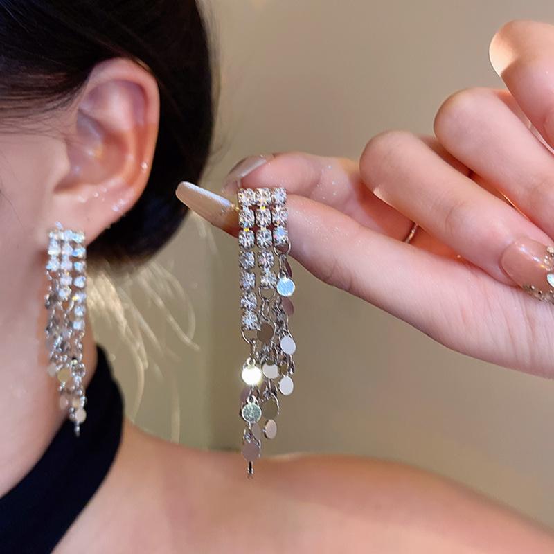 Korean long tassel diamond-set gold sequined stud earrings women s light luxury temperament earrings niche unique earrings