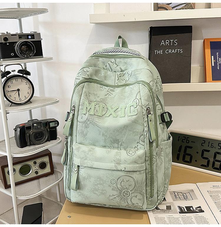 Schoolbag trendy school bag male high school student female graffiti junior high school student backpack college student large capacity lightweight