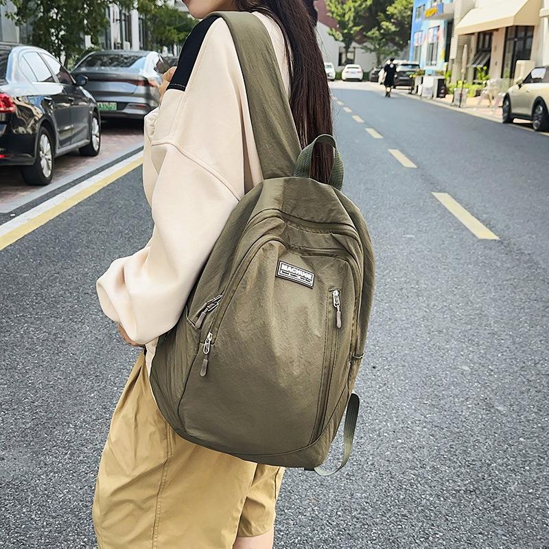 Schoolbag Korean version of simple student backpack male and female college students casual versatile backpack sports cycling tooling bag