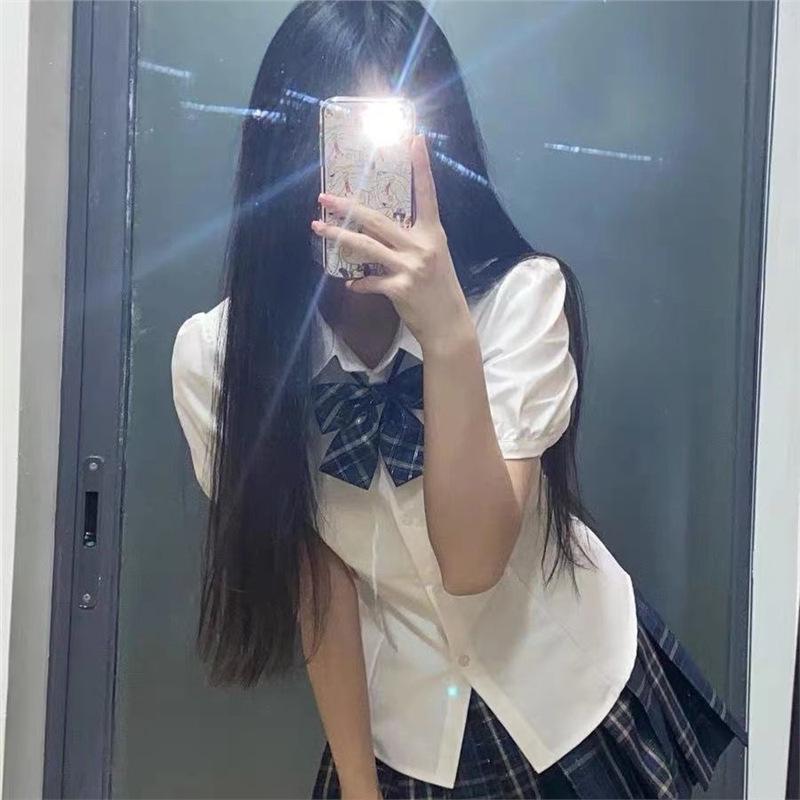 

Сладкий и острый двухкомпонентный костюм в академическом стиле: Приталенная рубашка JK с завязкой и юбка в французскую клетку L