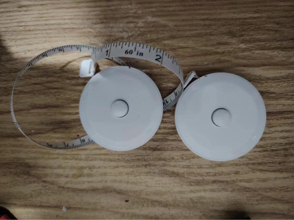 Retractable Double-Sided Tape Measure for Bust, Waist, and Hips - Soft, Compact Tailor's Ruler for Household and Clothing Measurements.