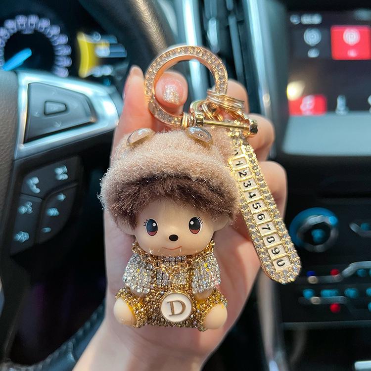 

Подарочная коробка для креативной шерстяной шапки Diamond: Брелок Qiqi и модный женский автомобильный брелок с защитой от потери номерного знака мобильного телефона.