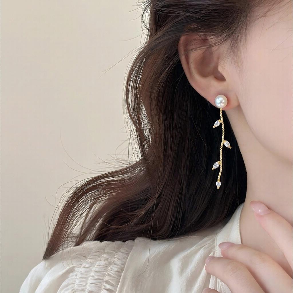 Natural freshwater pearl earrings with micro inlaid zircon leaves and simple design of willow branches. A multi wearing pearl jewelry