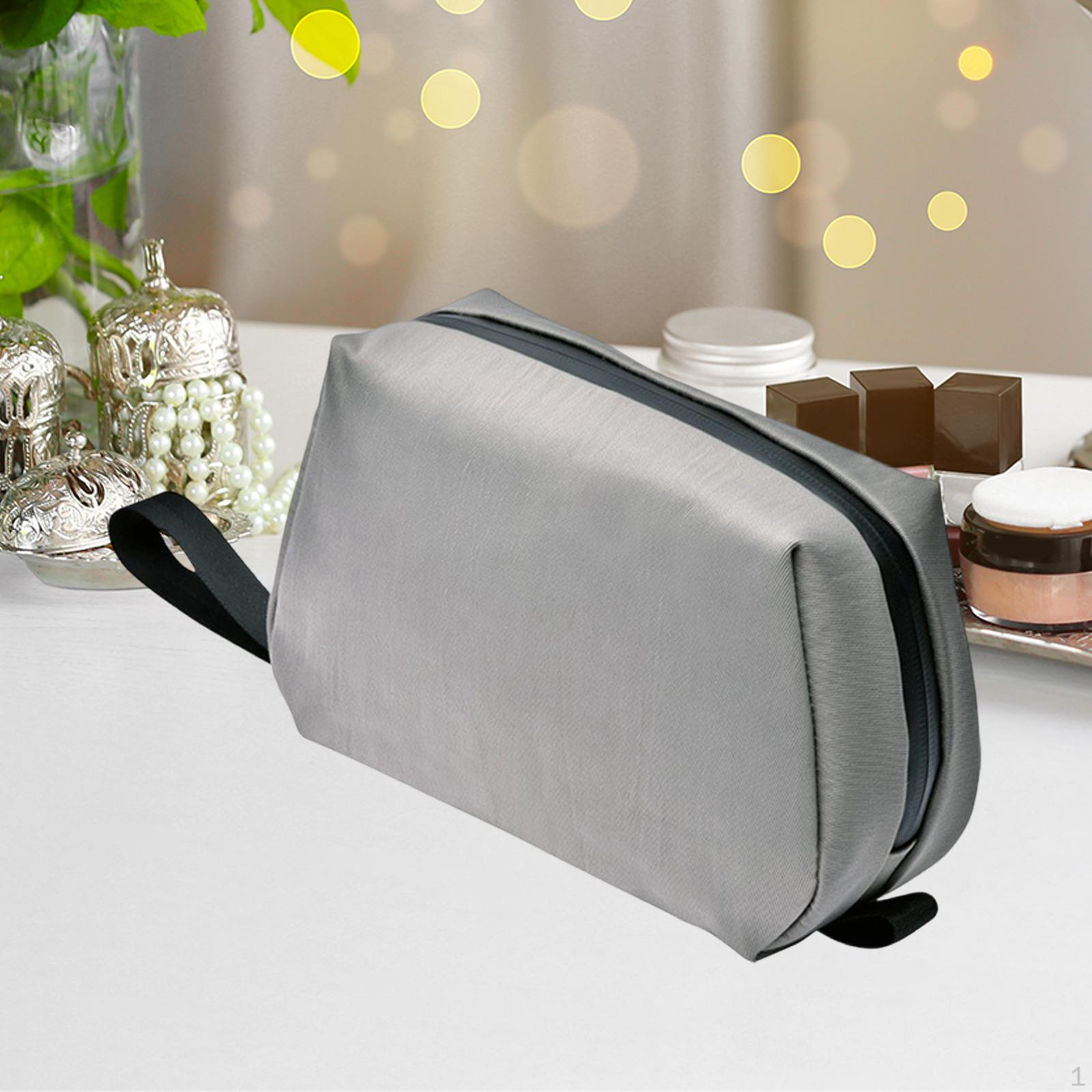 

An Essential Portable Makeup Bag for And Toiletries Organizer. сірий колір