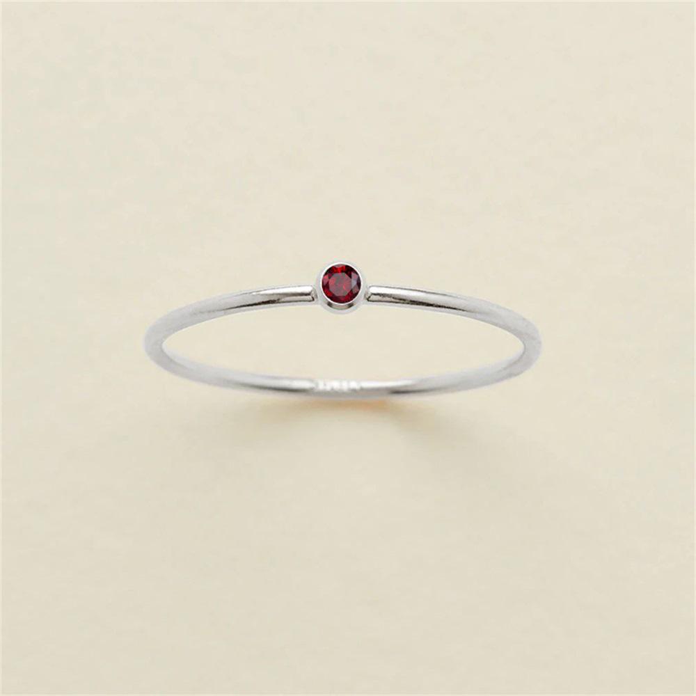 eManco Gold-Plated Non-Constricting Ring for Women - Thin Band with Tiny Diamond Accents and December Birthstone