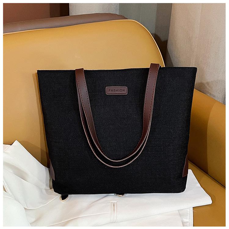 Cotton and linen casual tote bags are hot-selling large-capacity portable bucket bags, fashionable and simple solid-color shoulder bags.