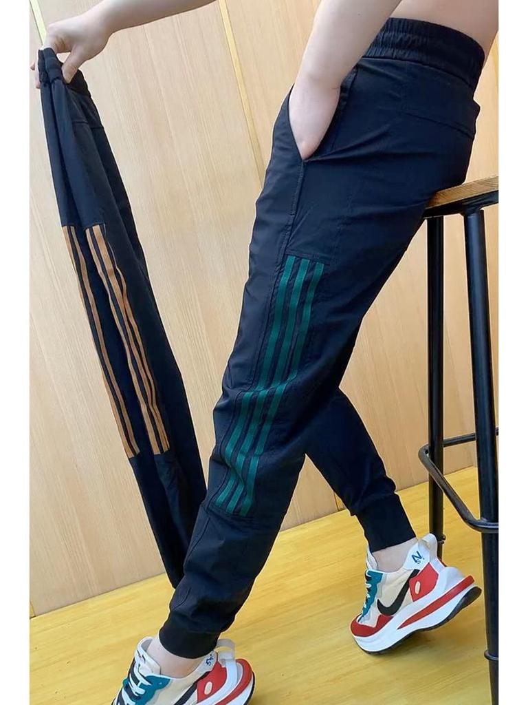 Men's Stylish Ice Silk Quick-Dry Harem Pants - Spliced, Fashionable, Versatile, and Trendy for Spring and Summer.