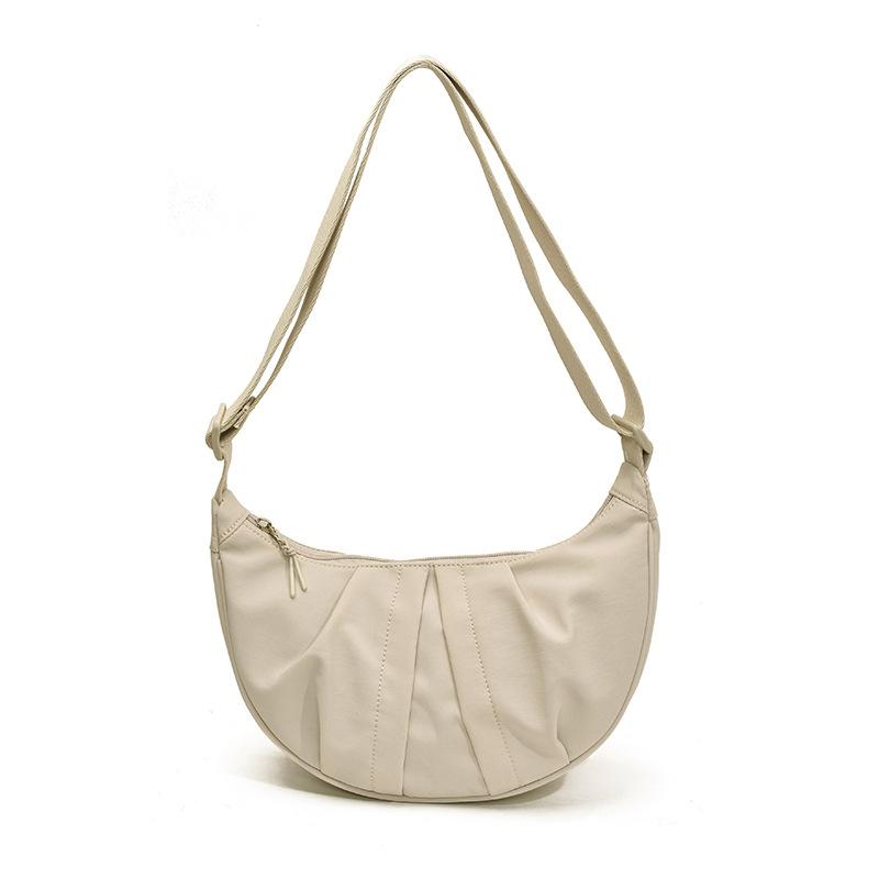 

2025 new Korean commuter lazy wind dumpling bag women s fashion messenger bag large capacity lightweight shoulder bag tide бежевый