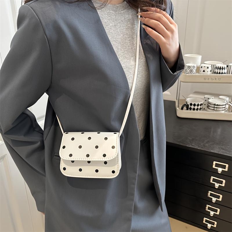 Stylish crossbody mini square bag, a high-end niche women's shoulder bag, the white polka dot design adds a fresh and youthful touch.