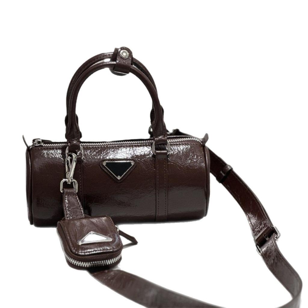 Leather bag New pillow bag Inverted triangular pleated cylinder One shoulder crossbody women's bag Commuter casual handbag