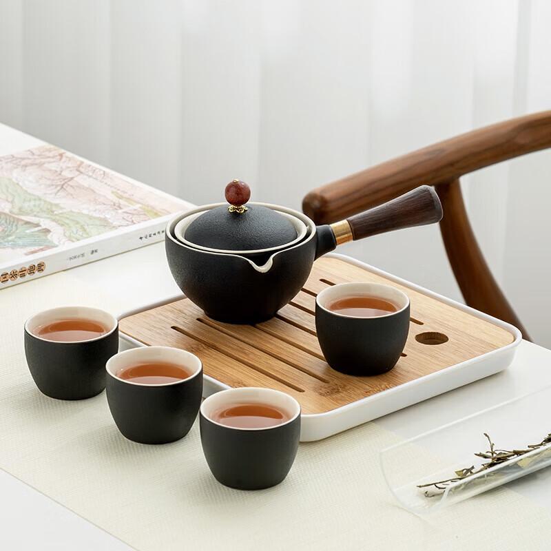 Elegant Black Ceramic Rotating Tea Set