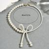 European and American style necklace women's niche bow imitation pearl design collarbone chain versatile light luxury pearl chain necklace decoration