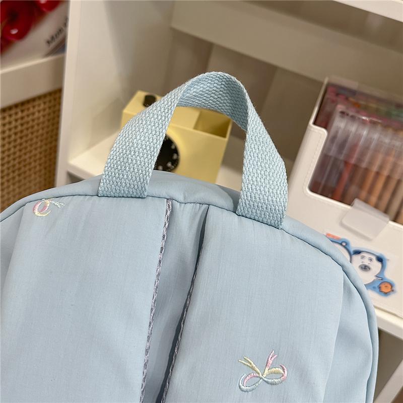 Zaino scolastico carino con ricamo a fiocco, tasca frontale, manico superiore, zainetto casual per uso quotidiano