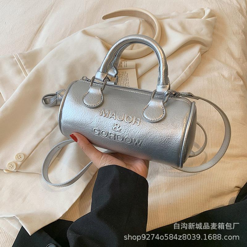 

Niche design fashionable portable small bag women s 2025 new trendy trend explosive shoulder crossbody cylinder bag срібний