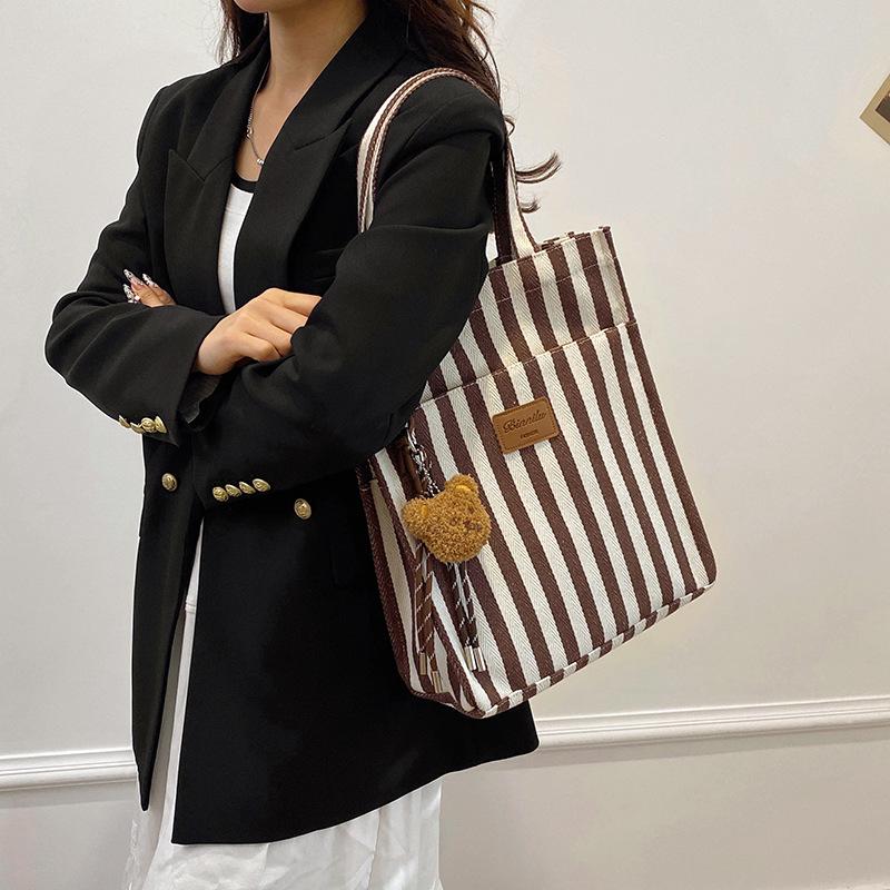 Commuter Large Capacity Leisure 2025 New Personalized Popular Striped Canvas Fashion Crossbody Portable Shoulder Tote Bag