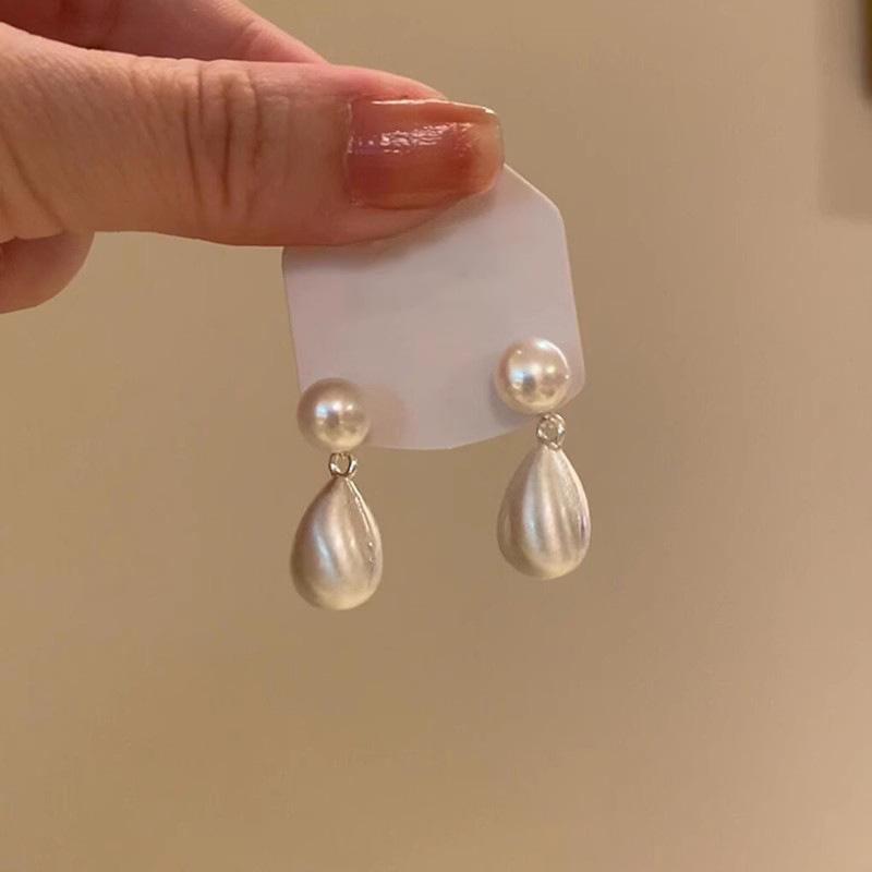 925 Silver Needle Pearl Earrings Women's High-end Sense Niche Temperament Bow Stud Earrings Retro Ear Jewelry Wholesale