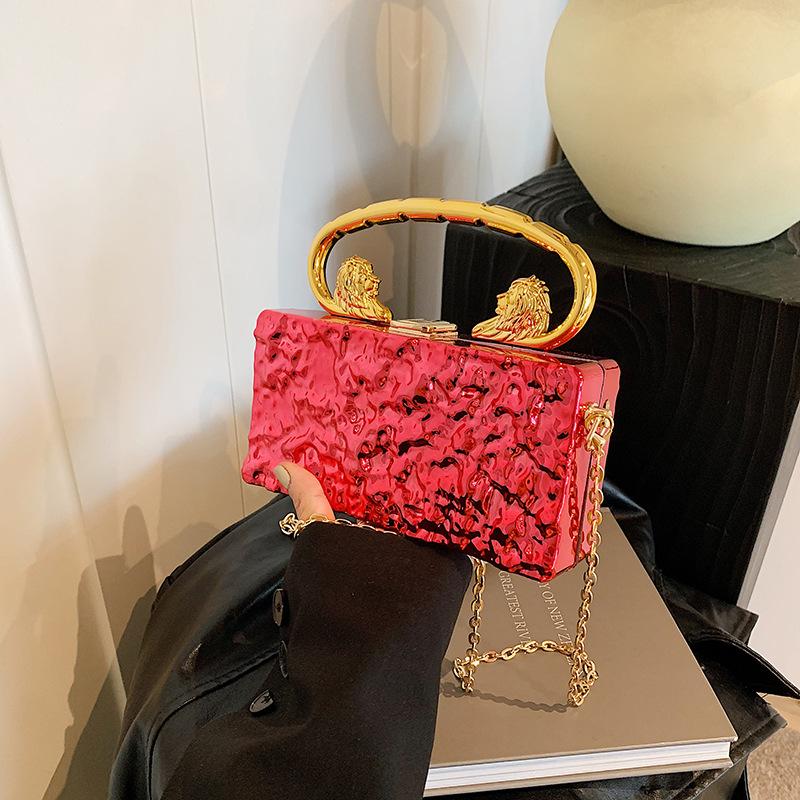 

Acrylic box bag women s 2025 new European and American fashion ice crack personalized portable messenger dinner bag tide прозорий