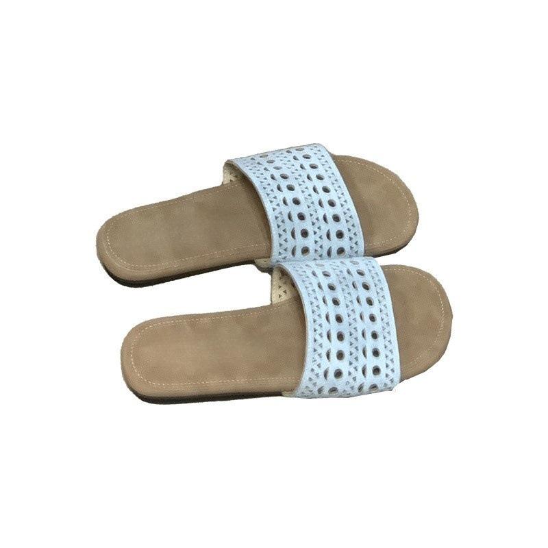 Ethnic style hollow cool slippers women's summer beach slippers 2025 new one-word drag niche