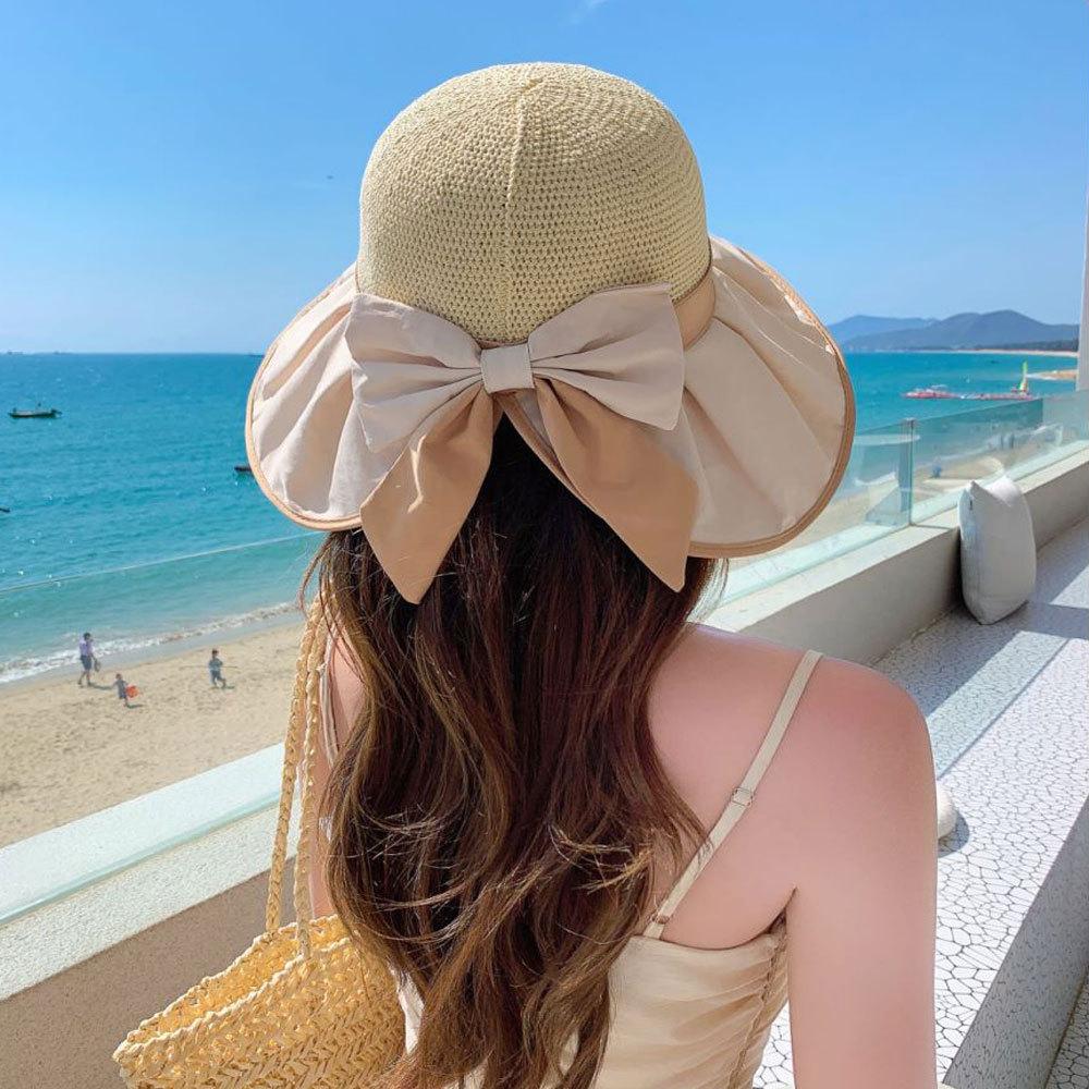 

Оптовая продажа модных летних новых соломенных шляп в форме банта для женщин с защитой от солнца и затенением, модные пляжные шляпы