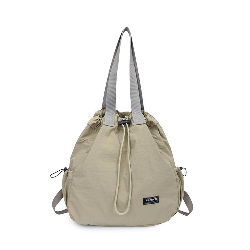 Schoolbag Large Capacity Drawstring Backpack Women's 1011 New Travel Outdoor Handheld Shoulder Bag Lazy Wind Tote Bag