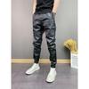 Men's Windproof & Waterproof PU Leather Pants - Trendy Korean Style, Six-Pocket, Cuffed, Solid Color Casual Trousers for Autumn & Winter.